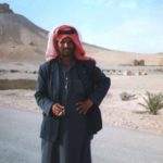 A Bedouin man in Palmyra, Syria with Palmyra Castle in the background