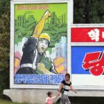 A textile factory propaganda mural in Pyongyang, North Korea